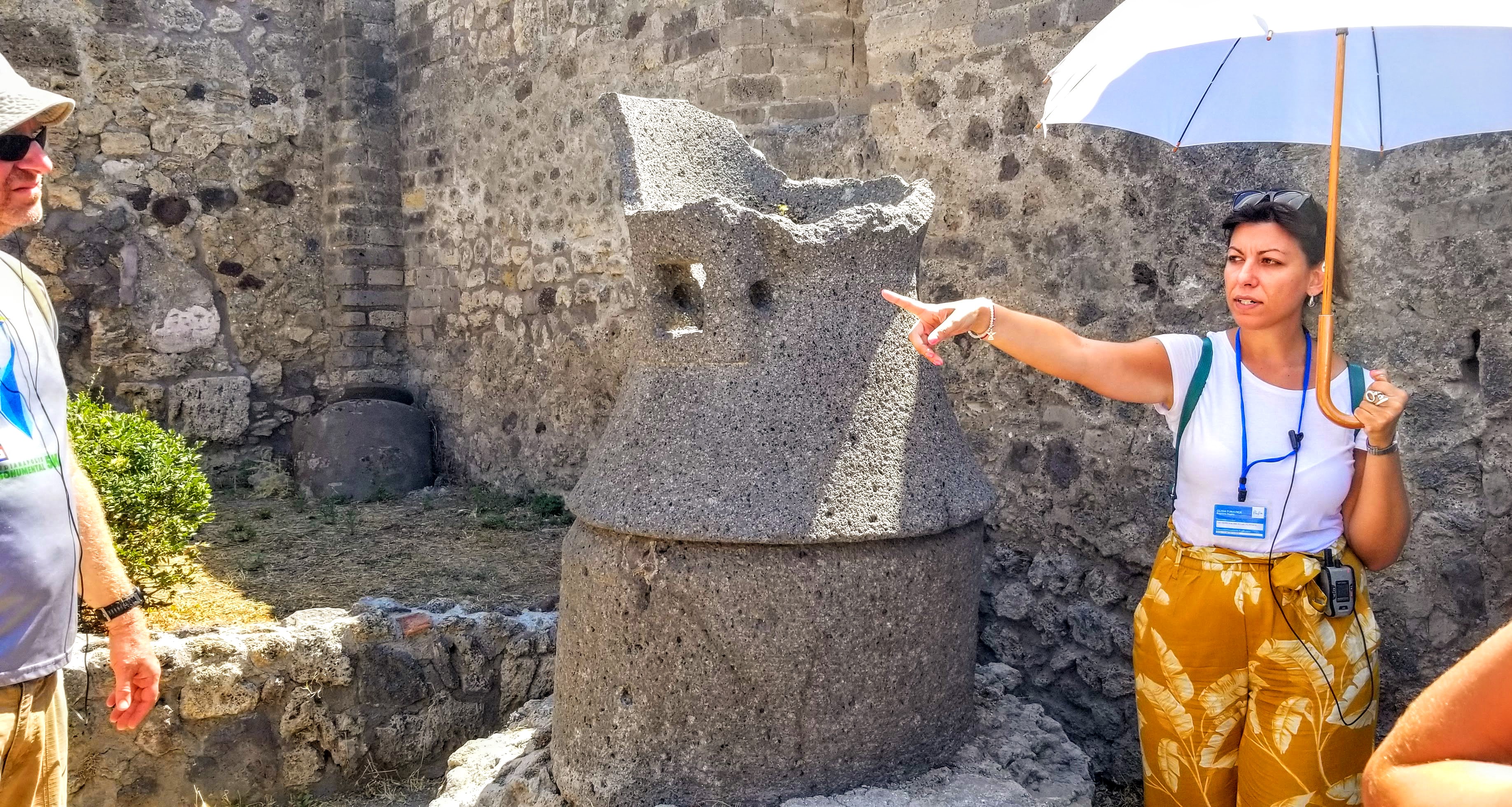 Ancient Roman millstone at a bakery in Pompeii.