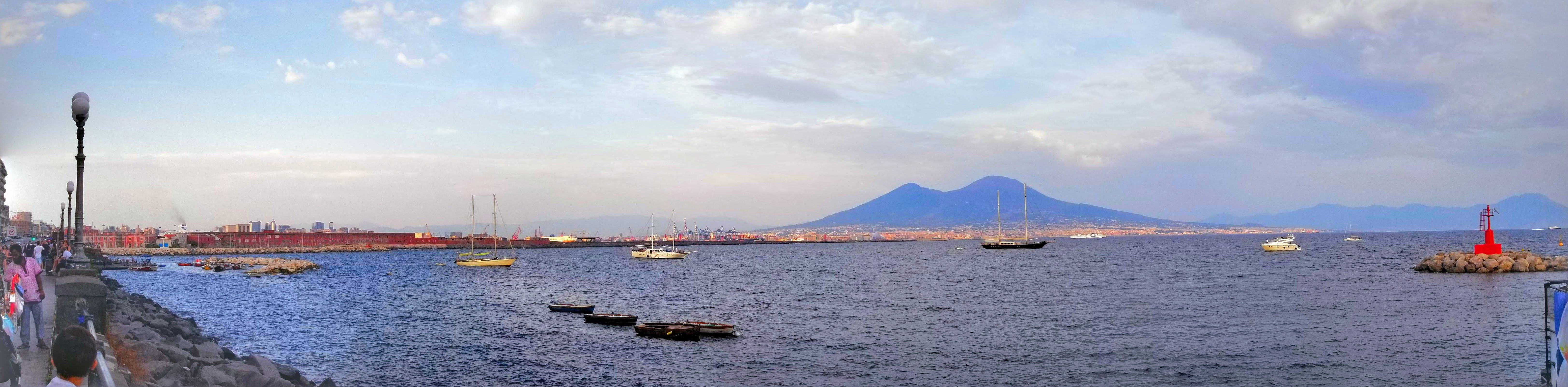 Mount Vesuvius, still an active volcano, silhouetted beyond the Bay of Naples, near Pompeii.