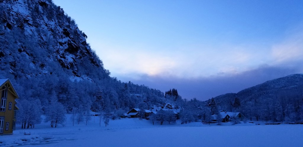 Photograph of a winter landscape with impending clouds.
